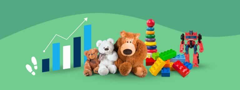 Aumentar o alcance Cabeçalho com um gráfico de linhas, um gráfico de colunas, duas pegadas e uma variedade de brinquedos