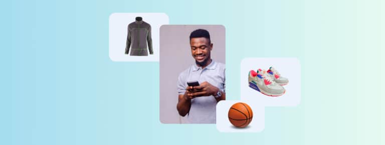A man on his phone surrounded by a basketball, sneakers and a running top