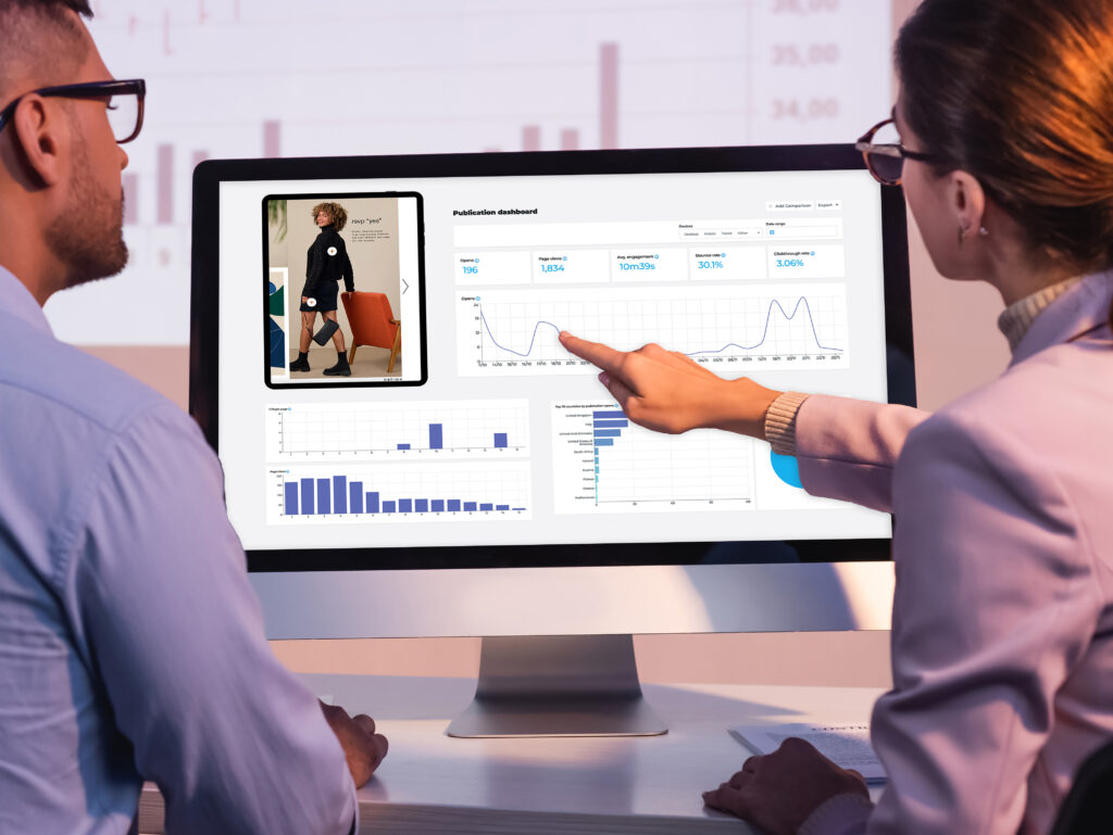 Unlock Hidden Easter Flyer Potential With This Data-Driven Shift 4 Businesswoman in glasses pointing with finger at computer monitor with blank screen near coworker in